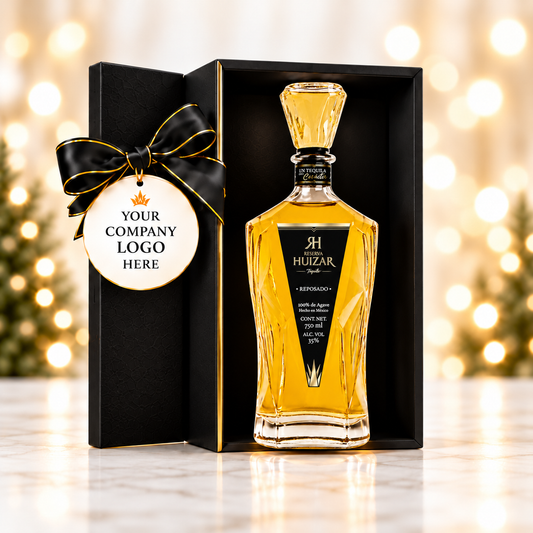 Reserva Huizar Reposado tequila in a black gift box with a company logo tag