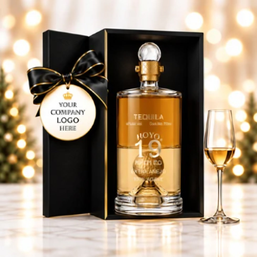 Hoyo 19 Extra Añejo tequila in a black presentation box with a company logo tag
